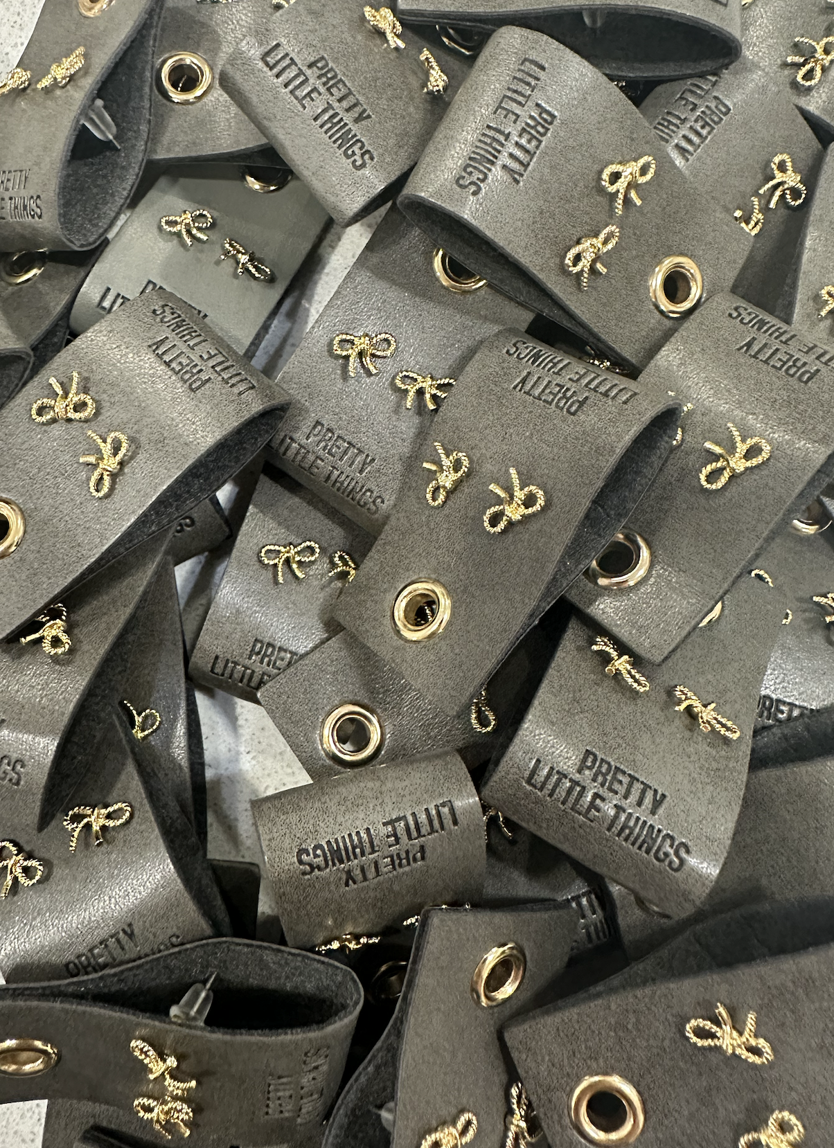 Leather Tag w/ Bow Studs