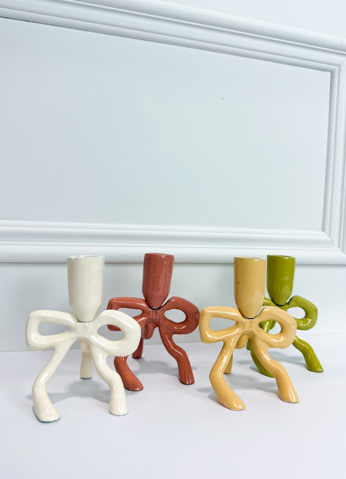 Taper Holder W/ Bow Shaped Base